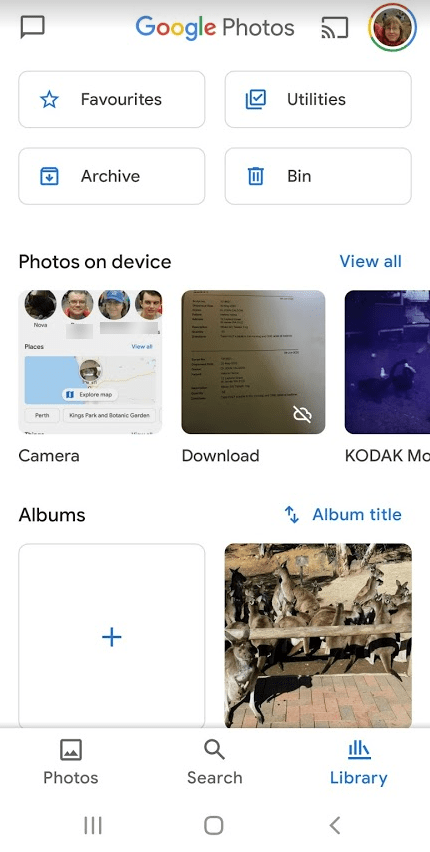How do I upload my entire photo library to Google Photos?